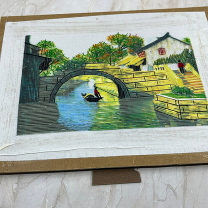 Vintage Unsigned Chinese String Wall Art Town Stone Bridge Water Canoe 7x9.5 TC9