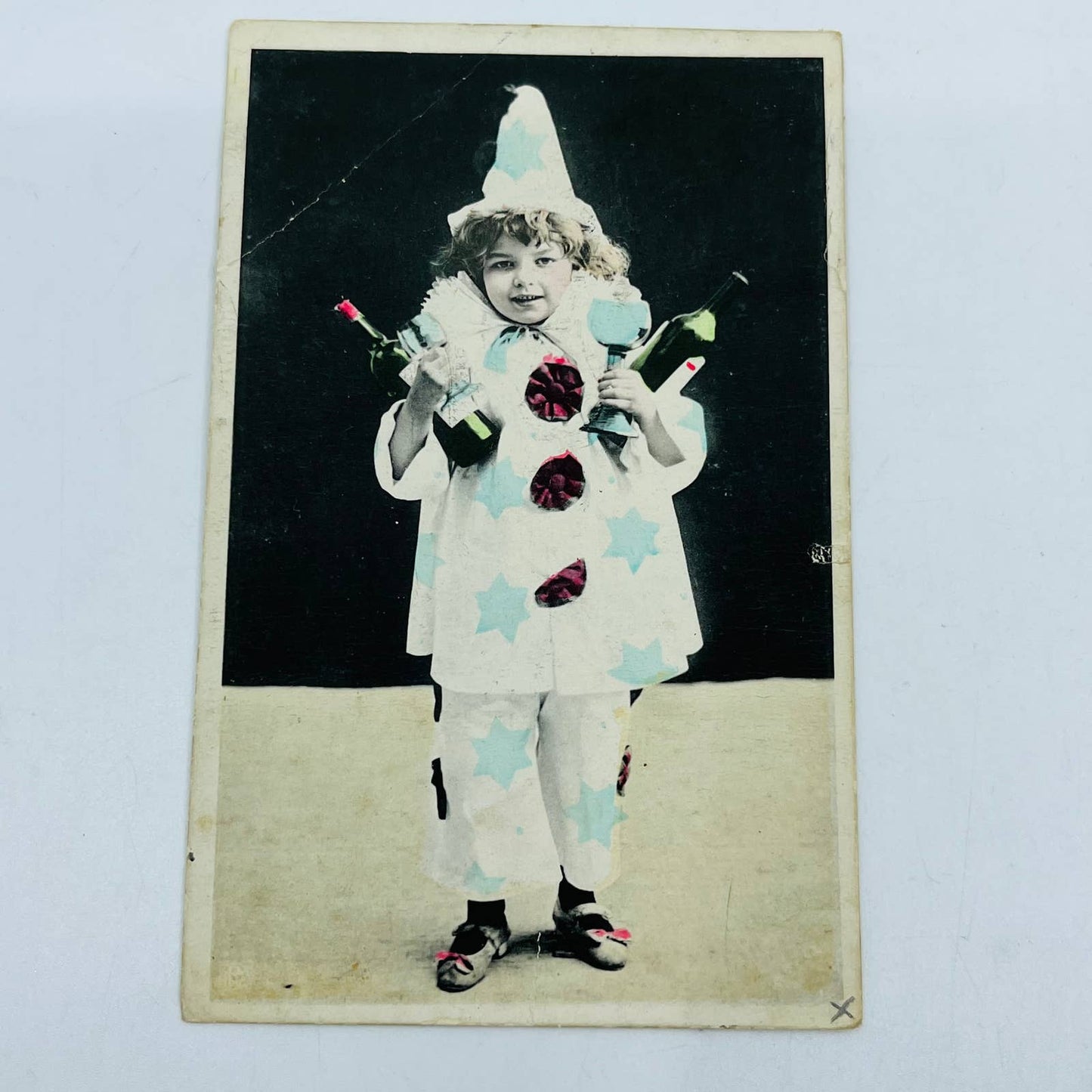 1908 Post Card Photo Tinted Little Girl Clown Costume Bottles PA7