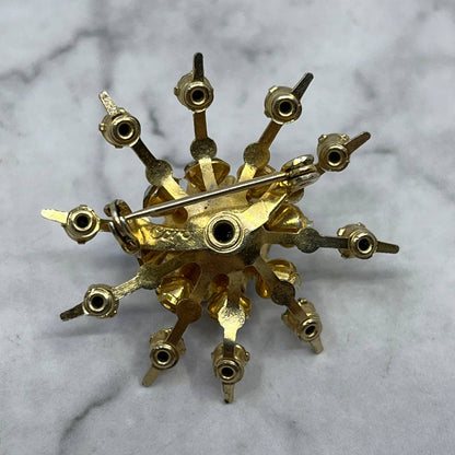 Vintage CORO Atomic Starburst Sapphire Rhinestone Pin Brooch Gold tone 1.25” SE7