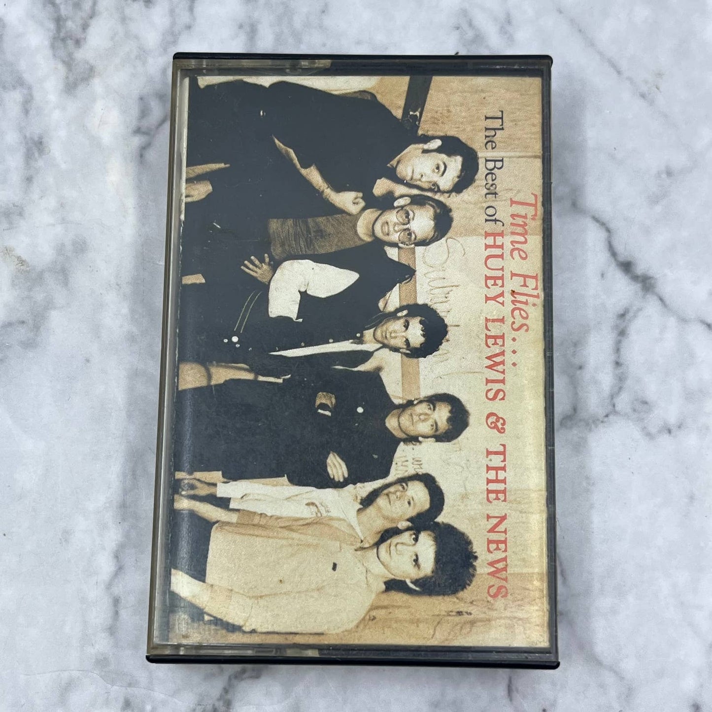 The Best Of Huey Lewis & The News- Time Flies... Cassette Tape TI8-2